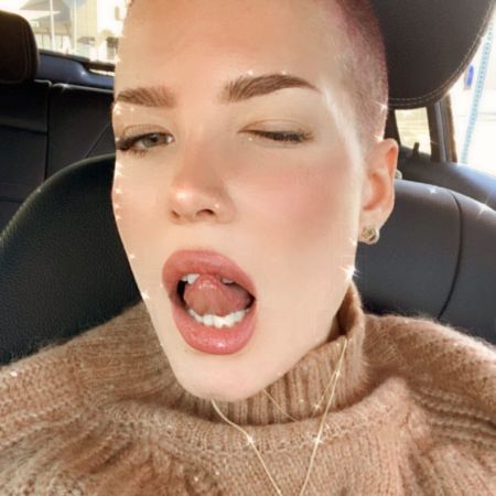 Halsey was wearing a wig this whole time, as her buzzcut was actually dyed pink.